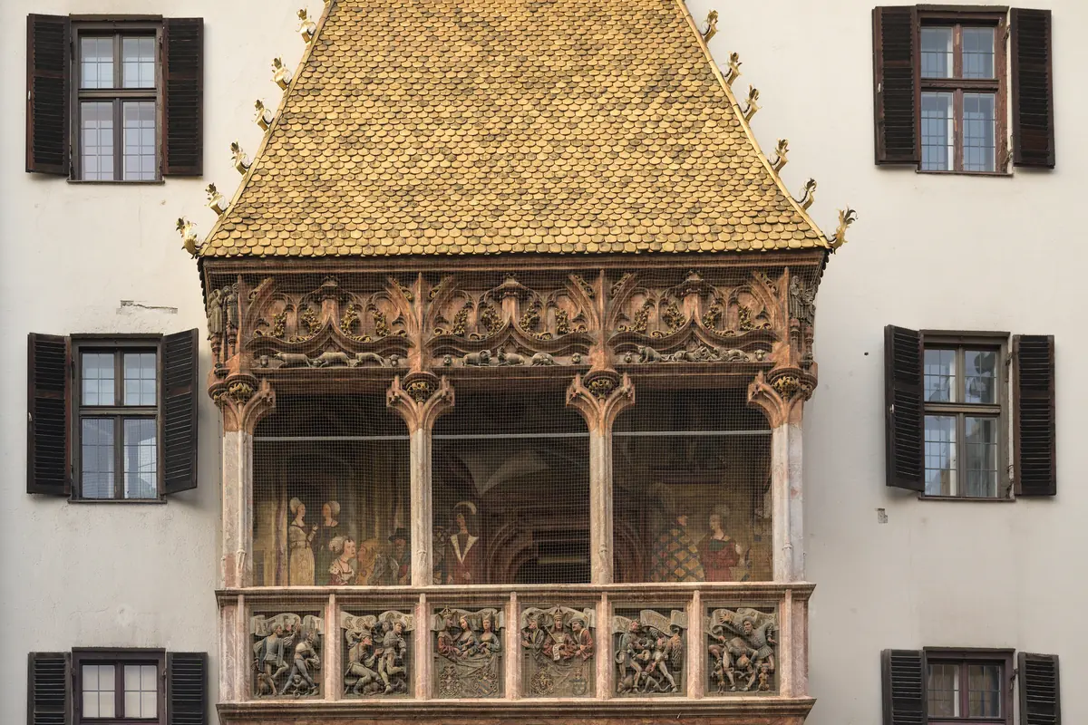 The Golden Roof oriel in the Old Town of Innsbruck, with its gilded copper tiles and carved balcony reliefs
